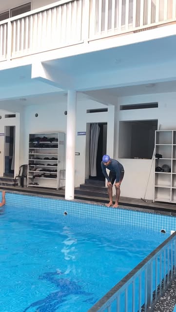 Swimmers in the covered pool